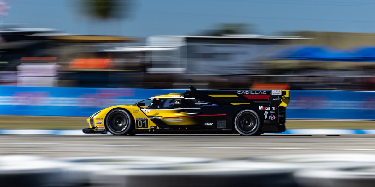 A Cadillac V-Series Vehicle Driving Ferociously Fast on the Track