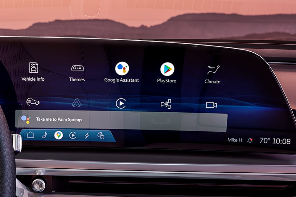 Close-up View of the Infotainment System in a Cadillac Vehicle With the Google Assitant Voice Activated