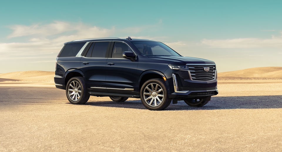 Cadillac Escalade Parked on Sand