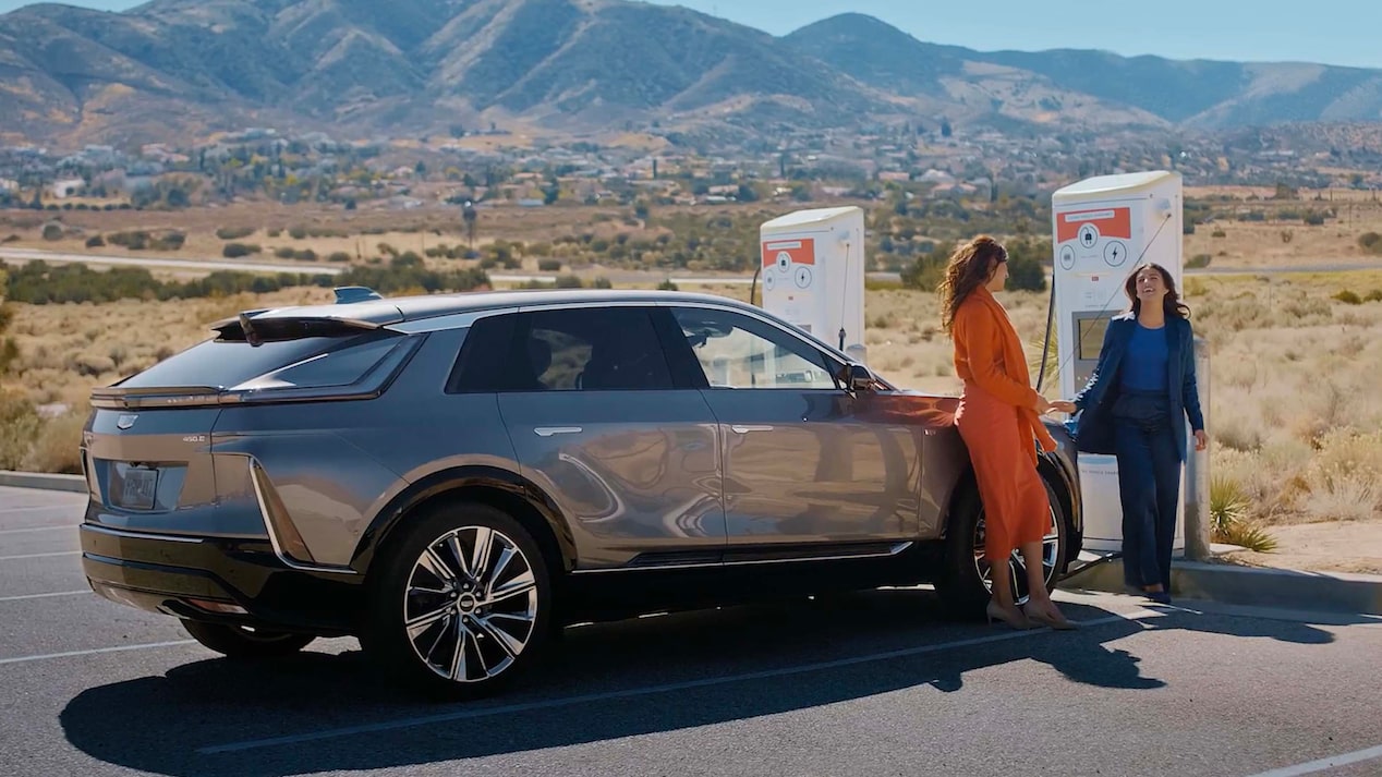 Two Women Chat As Their Cadillac LYRIQ Fast Charges