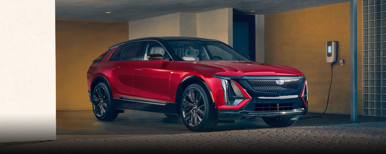 A Cadillac LYRIQ Charging in a Garage at Home