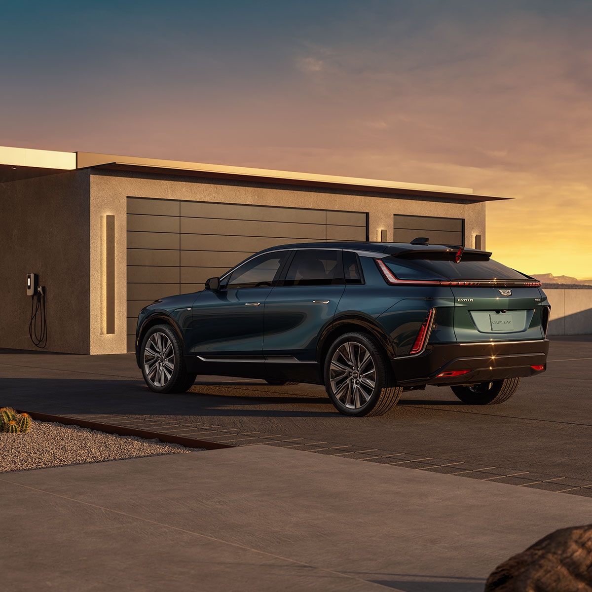 The Cadillac LYRIQ Parked in front of a Garage During a Beautiful Sunset